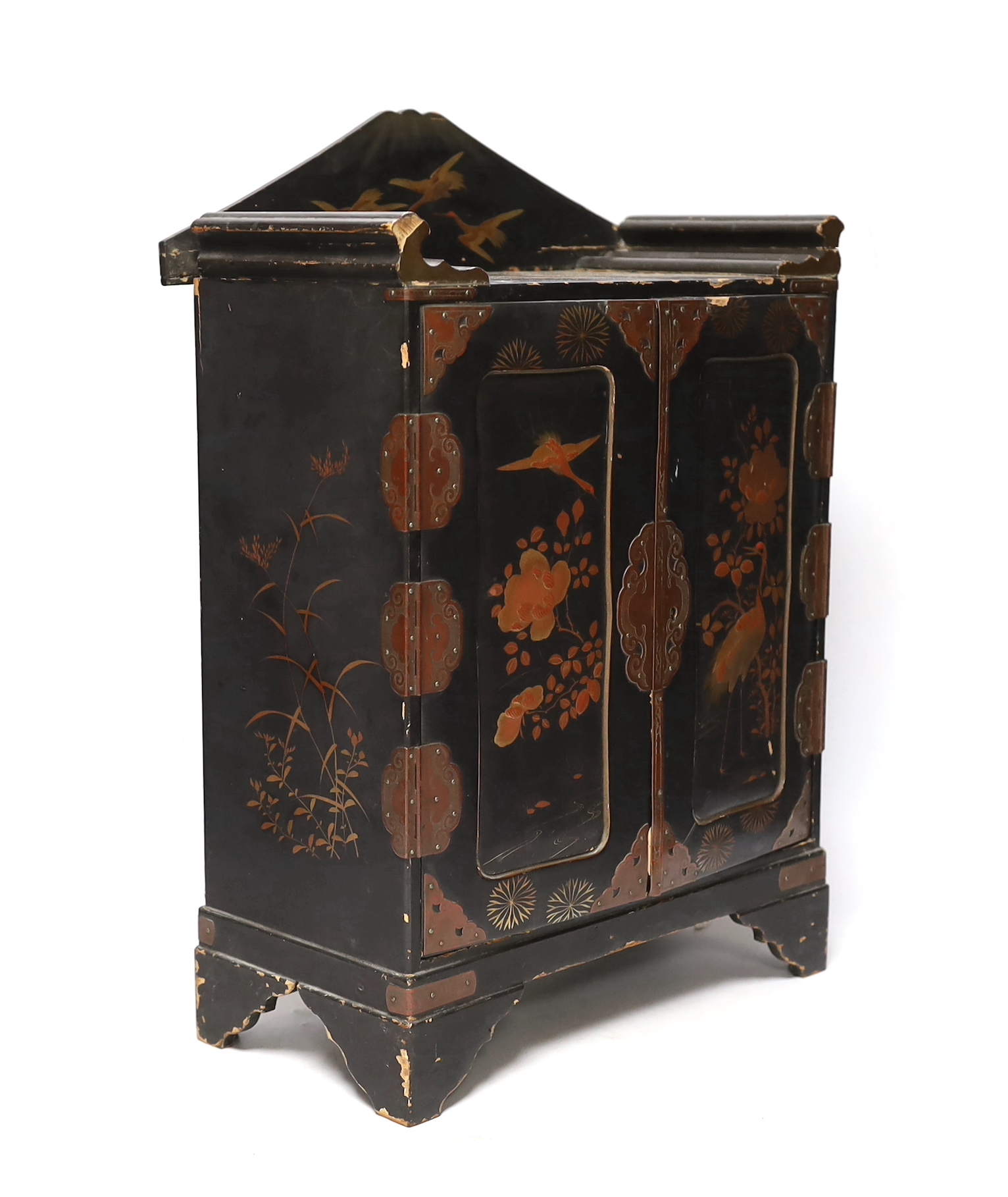 A Japanese casket with fitted interior, lacquered with birds and flowers, 42cm high